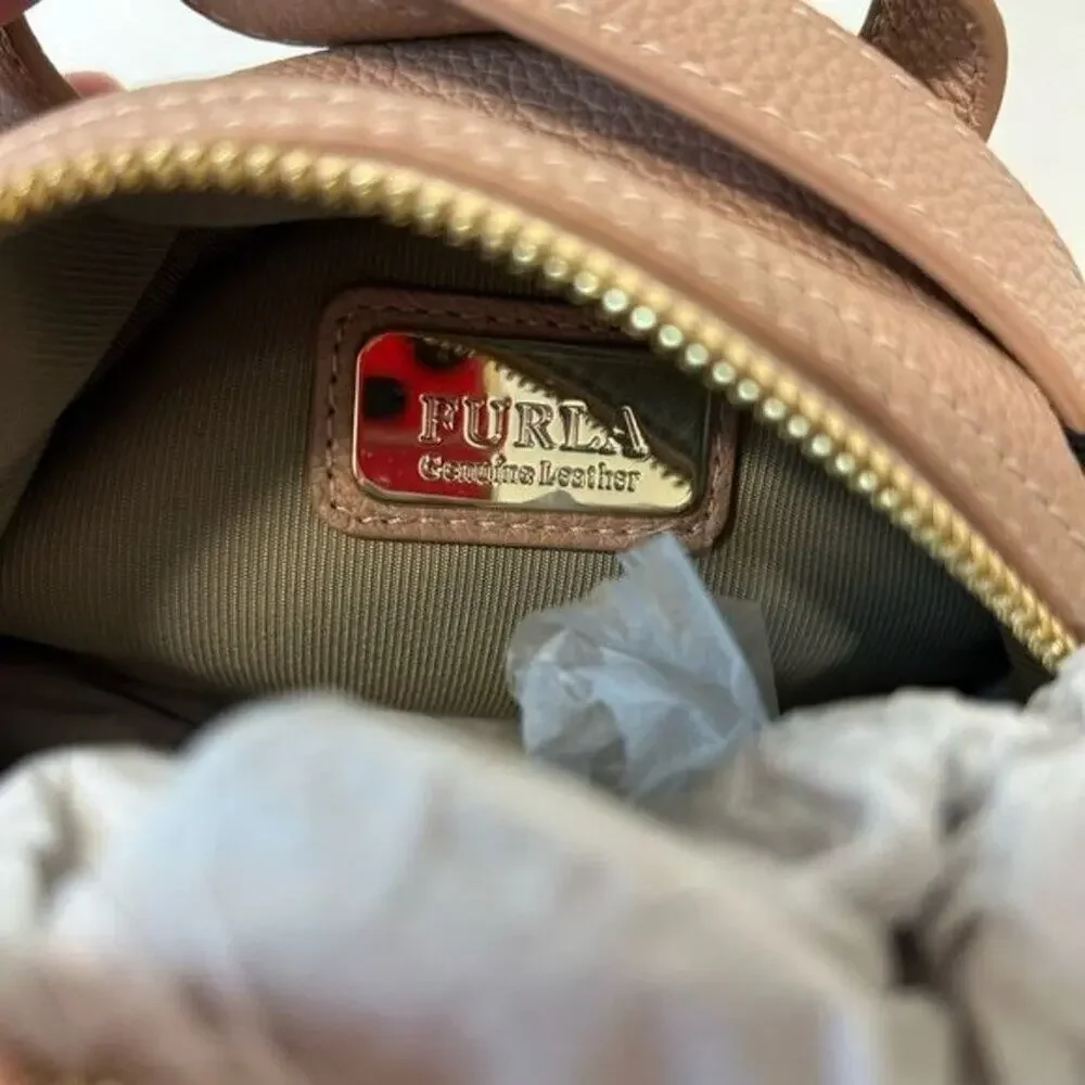Furla Frida Mini backpack in Moonstone ( pale pink) with Rose Gold hardware New